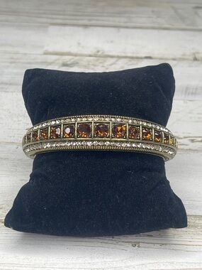 Heidi Daus Topaz Crystal Channel Set Hinged Bangle Bracelet